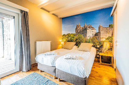 Slaapkamer met badkamer in Chalet Durbuy XL